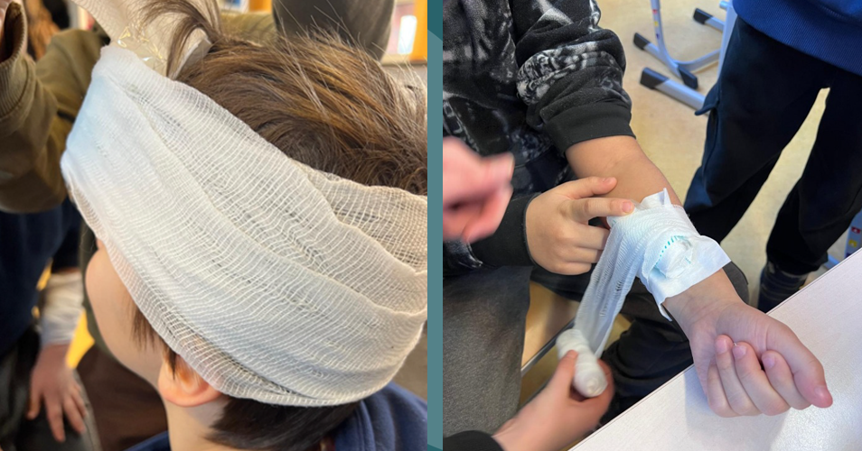 Kinder legen Wundverbände an